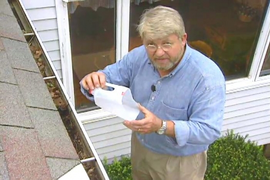 How to Clean Debris from Gutters and Downspouts
