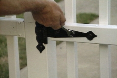 mounting the hinge on the vinyl picket fence gate