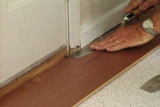sawing off door casing to fit laminate flooring
