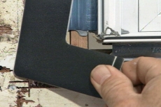 applying corner seals on the retro-fitted window flanges