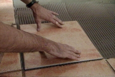 seating the tiles in the thin-set mortar
