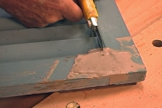 shaping wood filler edges with a utility knife
