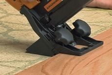 securing hardwood flooring planks with a special stapler