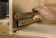 installing the drawer glides for the pull-out shelves