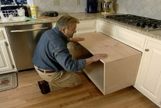 testing the pull-out shelves beneath the cook top