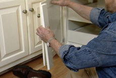 securing a replacement stile to the cabinet door