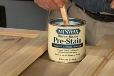 Applying wood conditioning pre-stain