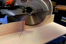 making a cut with the miter saw