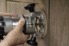 using a router to cut an opening for the exterior door