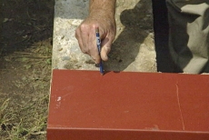 marking holes for steel bulkhead basement door foundation plate