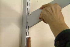 mounting shelf brackets for the garage organization system