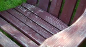 Deteriorated finish on wooden outdoor chair