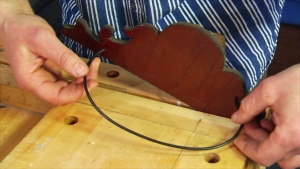 attaching the bedspring clamp to a broken furniture crest