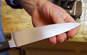 holding a sharp knife