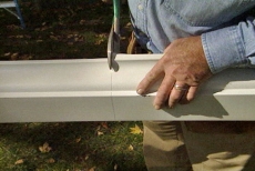 cutting gutter with tin snips
