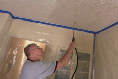 spraying ceiling with water