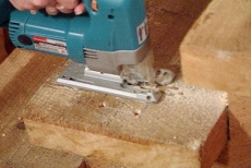cutting a hole for the newel post