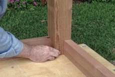 butting rails against the tenons on the table legs