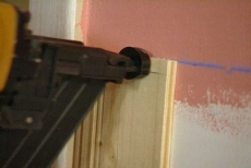 securing the wainscoting panels