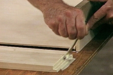 attaching the fourth side of the roll-out under-bed storage box