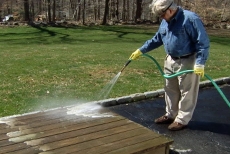 removing the cleaner with a high-pressure water hose