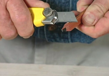 sharpening a carpenter's pencil