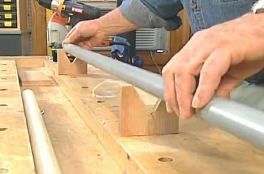 using wood to hold a pipe steady