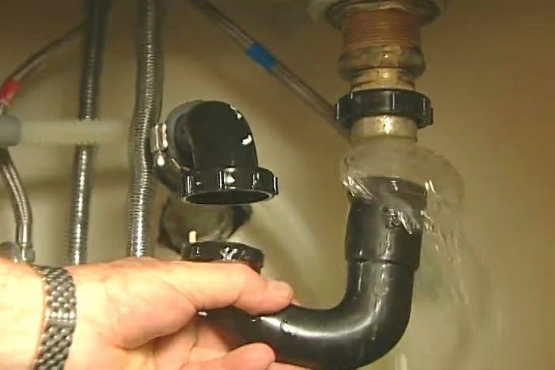 Clearing a Clogged Sink Drain by Cleaning the P-Trap