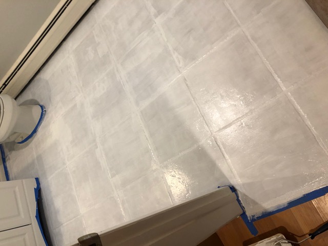 second coat of painted floor tile