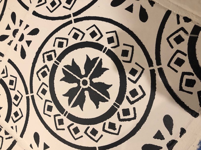 close up of floor tile stencil pattern