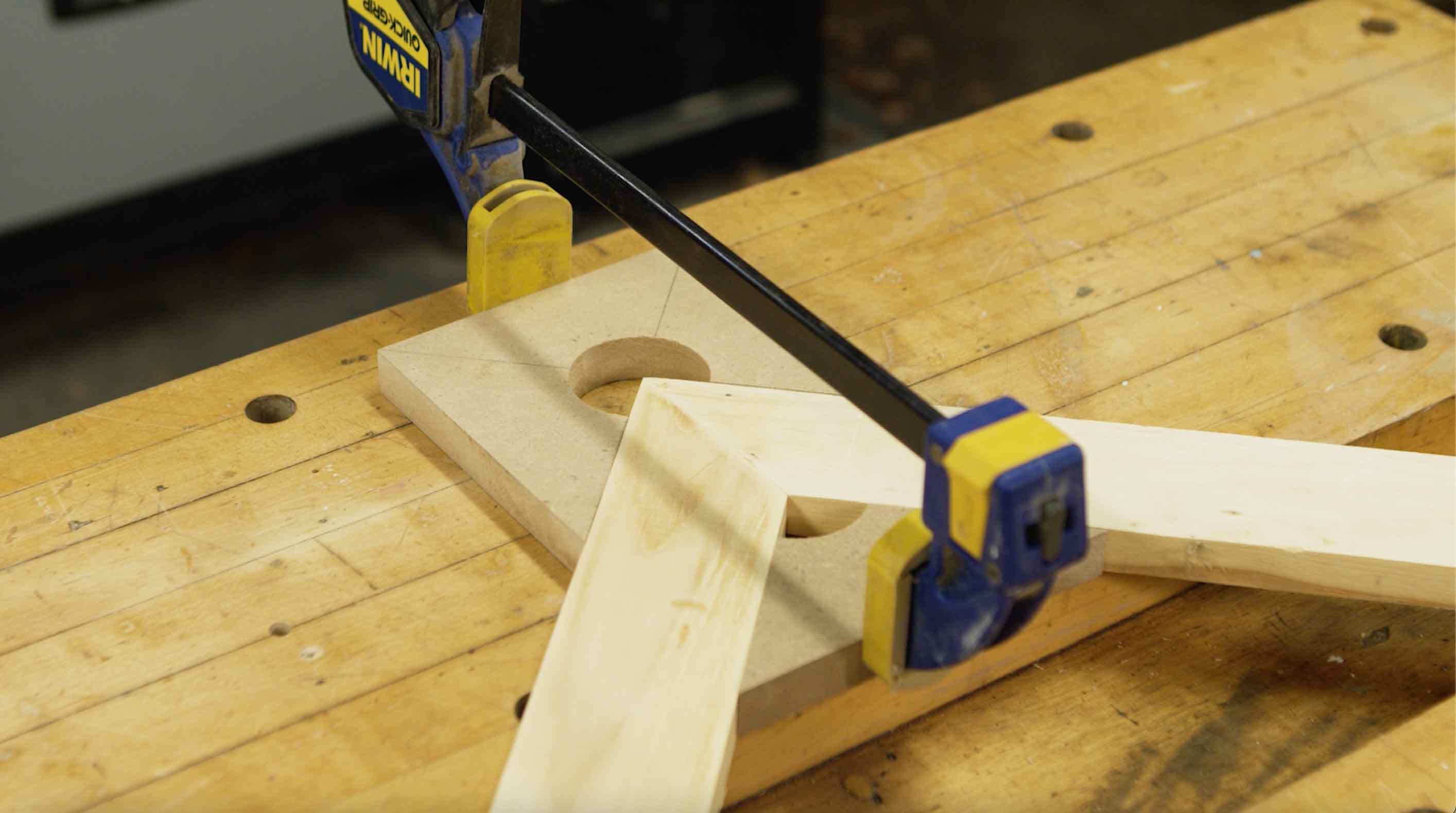 Clamp jig holding mitered corners together