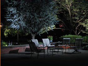 Patio with outdoor lighting at night