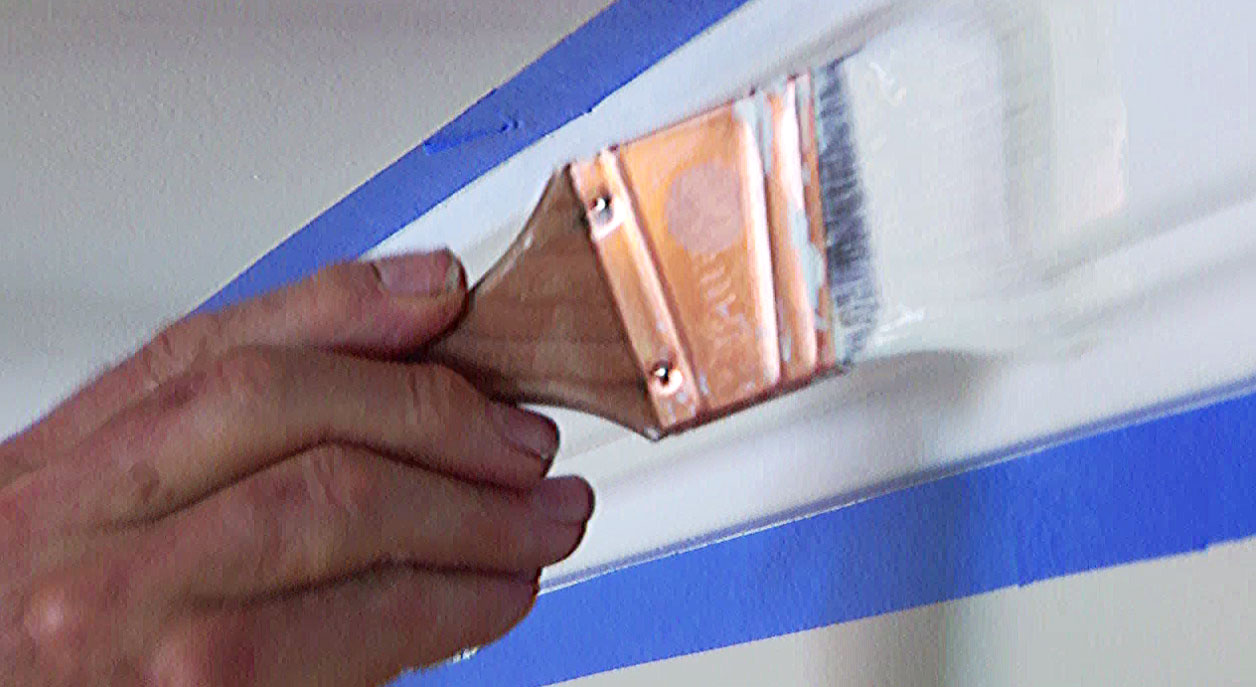 Paintbrush painting crown molding 
