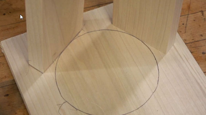 circle drawn in pencil on wood