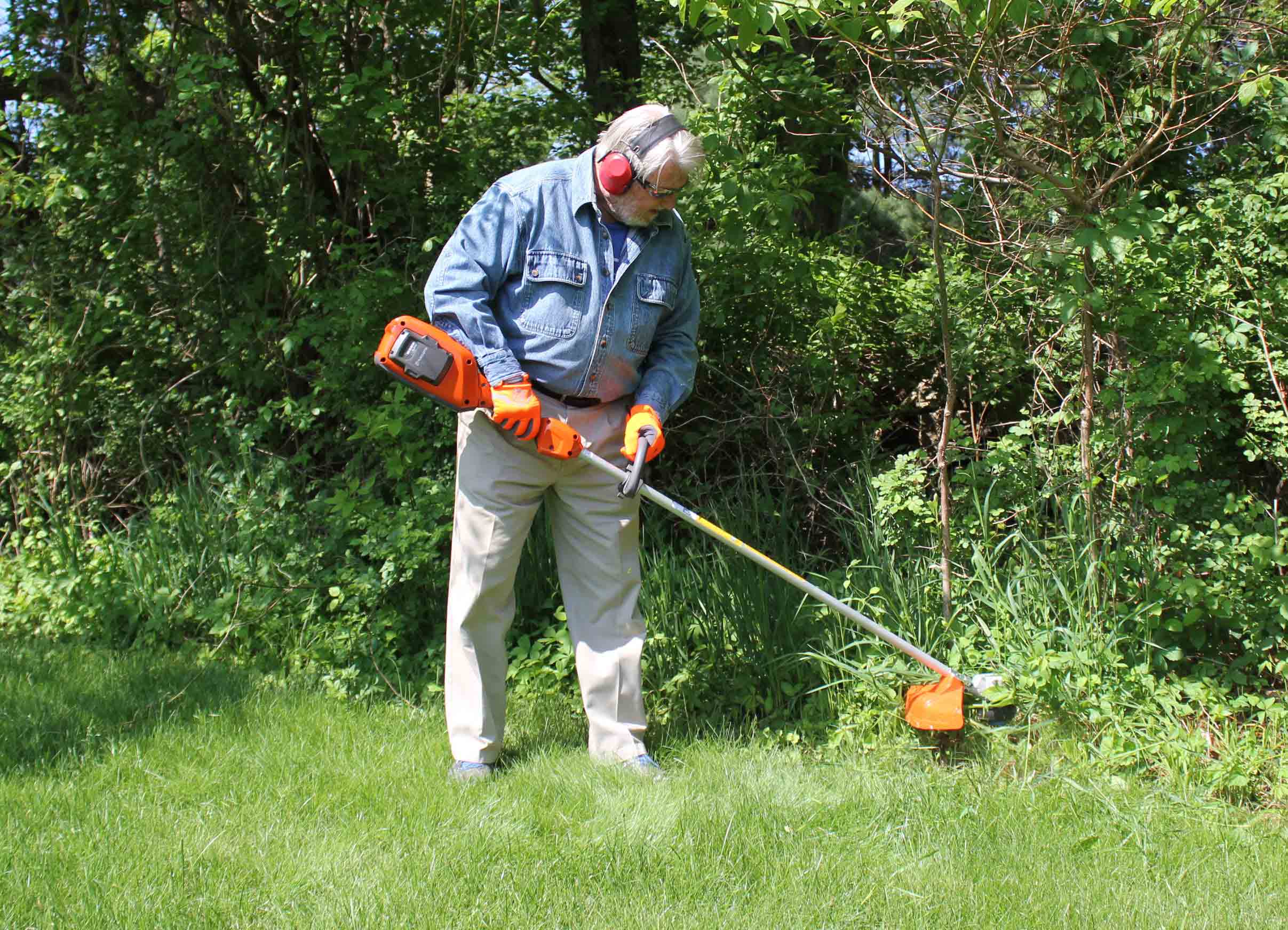 Man with string trimmer