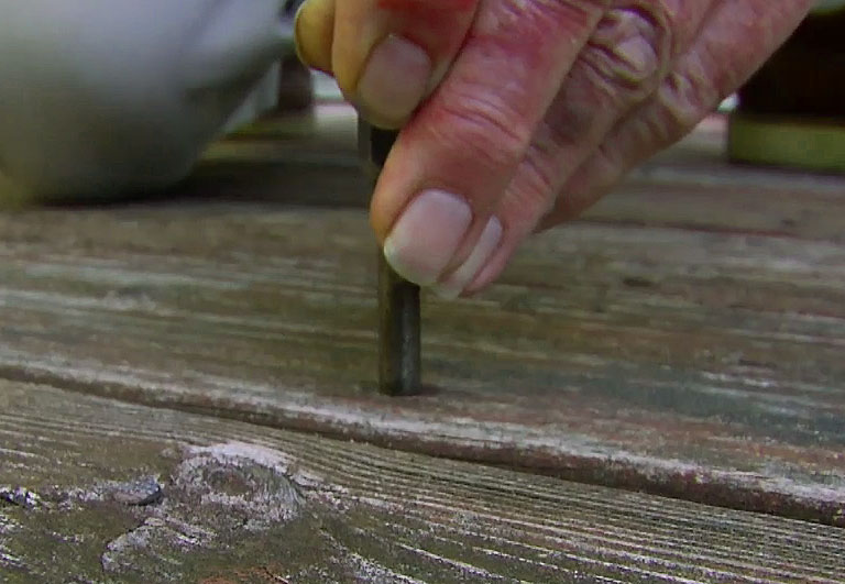 Setting nails into an outdoor deck 